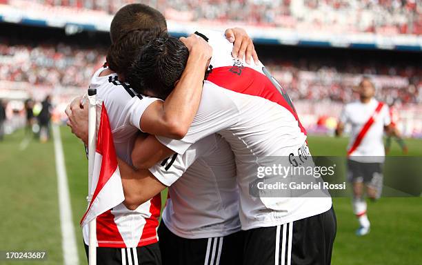 Players of River Plate celebrate a goal during a match between River Plate and Independiente as part of the Torneo Final 2013 at the Monumental...