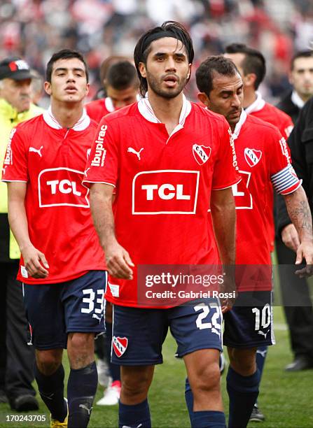 Players of Independiente lament after a match between River Plate and Independiente as part of the Torneo Final 2013 at the Monumental Vespusio...