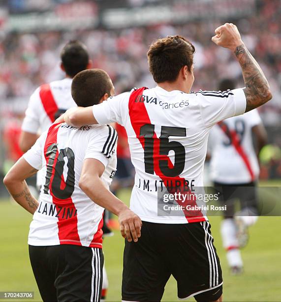 Manuel Lanzini and Juan Iturbe of River Plate celebrate a goal during a match between River Plate and Independiente as part of the Torneo Final 2013...