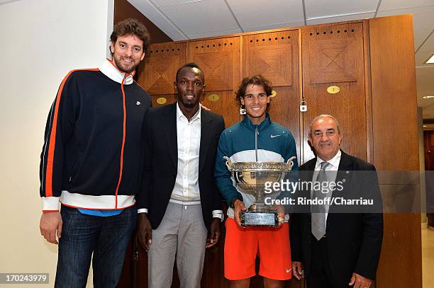 Guest, champion Usain Bolt, winner of Rolland Garros 2013 Rafael Nadal and president of FFT Jean Gachassin after the Final of Roland Garros Tennis...