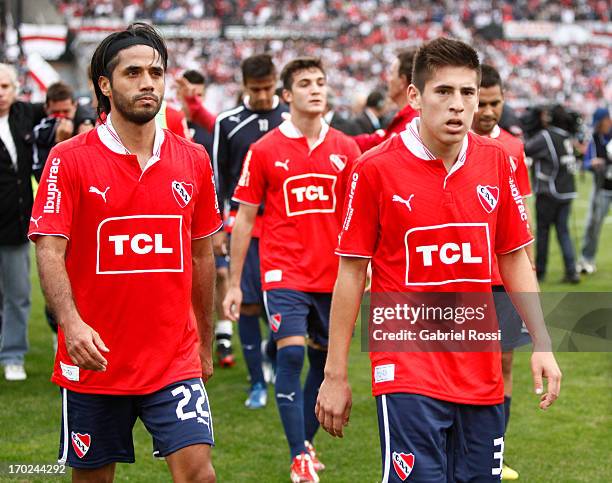 Fabian Vargas, Francisco Pizzini and Lucas Villalba of Independiente lament after a match between River Plate and Independiente as part of the Torneo...