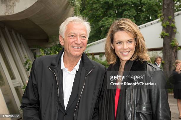 Laurent Boyer and Julie Andrieu sighting at the french open 2013 at Roland Garros on June 9, 2013 in Paris, France.