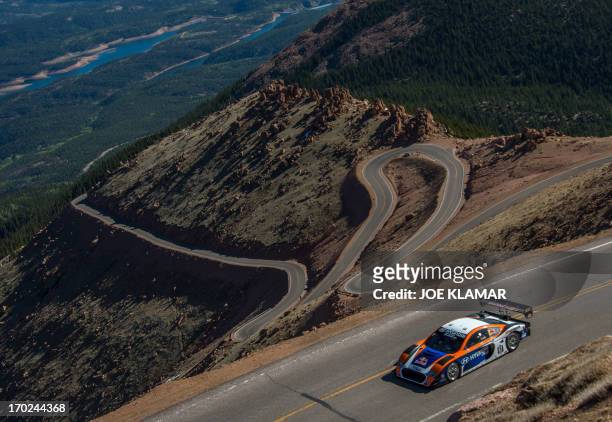 Rhys Millen, the current record holder with 9m46.164 tries out his Hyundai Genesis to the top of Pikes Peak mountain as he prepares for the June 30...