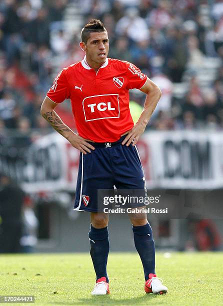 Cristian Tula of Independiente laments after a match between River Plate and Independiente as part of the Torneo Final 2013 at the Monumental...