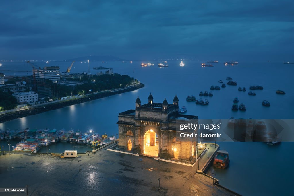 Illuminated Gateway of India at night