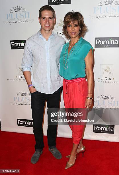 Host Jason Kennedy and actress Lisa Rinna attend the 2013 Plush Show at the Hyatt Regency Century Plaza on June 9, 2013 in Century City, California.