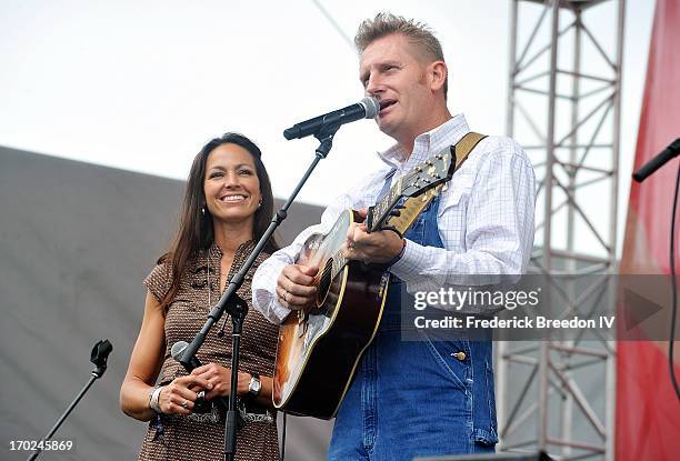 Rory Feek and Joey Feek of the band Joey & Rory perform on the Chevrolet Riverfront Stage during the 2013 CMA Music Festival on June 9, 2013 in...