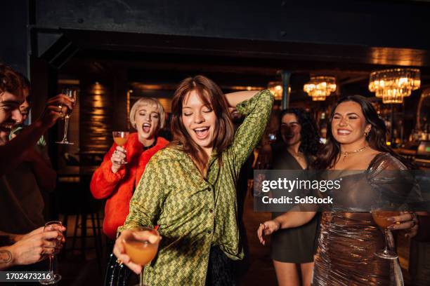 dancing with friends - nightclub uk stock pictures, royalty-free photos & images