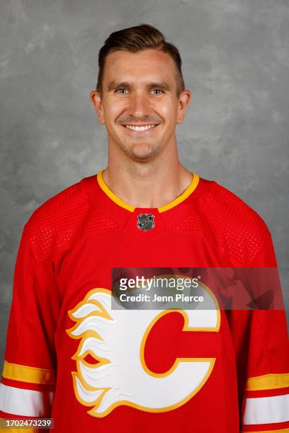 Mikael Backlund of the Calgary Flames poses for his official headshot for the 2023-2024 season at Scotiabank Saddledome on September 19, 2023 in...