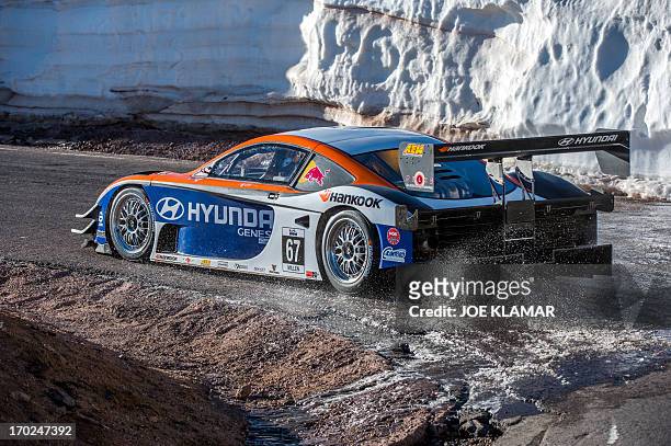 Rhys Millen, the current record holder with 9m46.164 tries out his Hyundai Genesis to the top of Pikes Peak mountain as he prepares for the June 30...