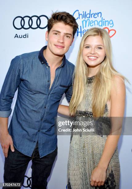 Actors Gregg Sulkin and Ana Mulvoy Ten arrive at the 1st Annual Children Mending Hearts Style Sunday on June 9, 2013 in Beverly Hills, California.