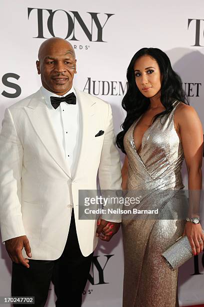 Former boxer/actor Mike Tyson and Kiki Tyson attend The 67th Annual Tony Awards at Radio City Music Hall on June 9, 2013 in New York City.
