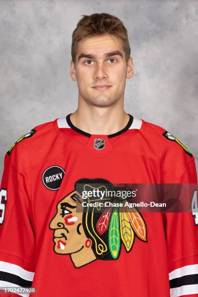 Louis Crevier of the Chicago Blackhawks poses for his official headshot for the 2023-2024 season at the United Center on September 21, 2023 in...