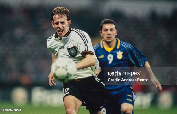German footballer Jorg Heinrich and Ukrainian footballer Vitaliy Kosovskyi during the 1998 FIFA World Cup qualification Group 9 match between Germany...