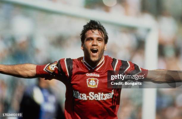 German footballer Ulf Kirsten celebrates after giving Bayer Leverkusen a 2-0 lead during the Bundesliga match between Borussia Monchengladbach and...