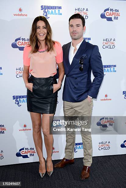 Lisa Snowdon and Dave Berry pose in the Media Room at the Capital Summertime Ball at Wembley Arena on June 9, 2013 in London, England.