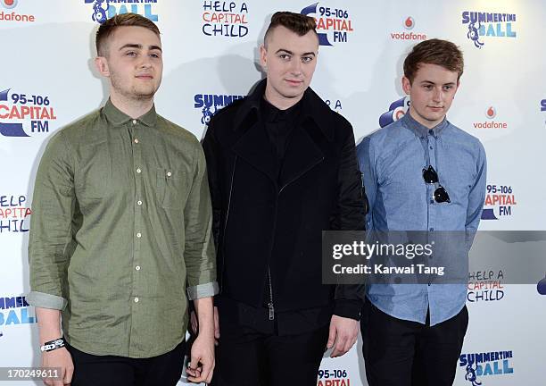 Sam Smith with Howard Lawrence and Guy Lawrence of Disclosure pose in the Media Room at the Capital Summertime Ball at Wembley Arena on June 9, 2013...