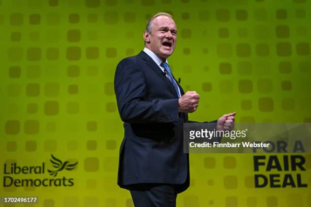 Sir Ed Davey, leader of the Liberal Democrats, gestures as he delivers his keynote speech during the Liberal Democrat conference at Bournemouth...
