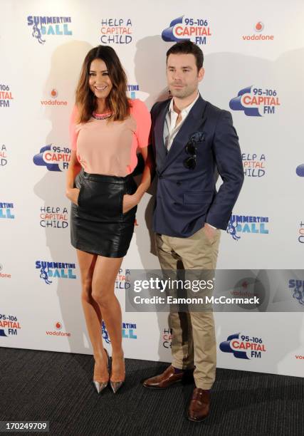 Lisa Snowdon and Dave Berry pose in the Media Room at the Capital Summertime Ball at Wembley Arena on June 9, 2013 in London, England.