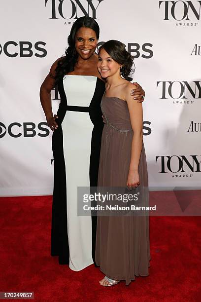 Actress Audra McDonald and daughter Zoe Madeline Donovan attend The 67th Annual Tony Awards at Radio City Music Hall on June 9, 2013 in New York City.