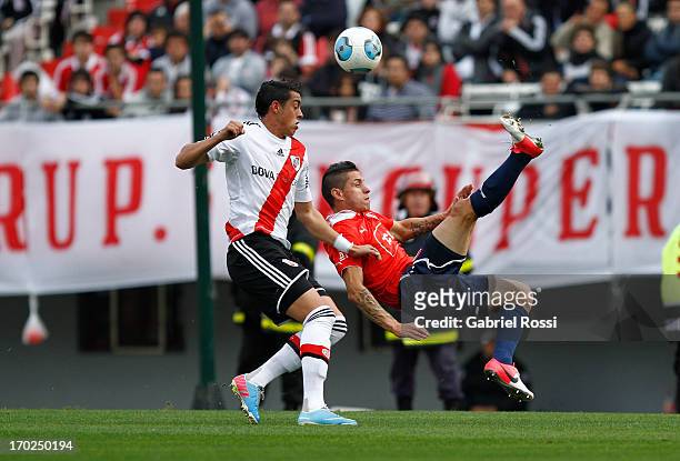 Cristian Tula of Independiente in action during a match between River Plate and Independiente as part of the Torneo Final 2013 at the Monumental...