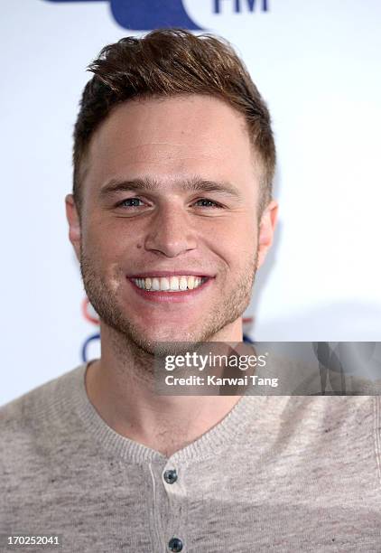 Olly Murs poses in the Media Room at the Capital Summertime Ball at Wembley Arena on June 9, 2013 in London, England.