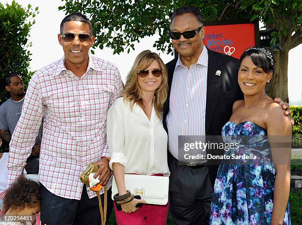 Chris Ivery, actress Ellen Pompeo with daughter Stella Ivery, Reverend Jesse Jackson and guest attend the 1st Annual Children Mending Hearts Style...