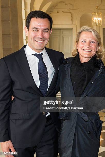 Olivier Josse and Elena Geuna attend the private visit of the exhibition by Italian artist Giuseppe Penone at Chateau de Versailles on June 9, 2013...