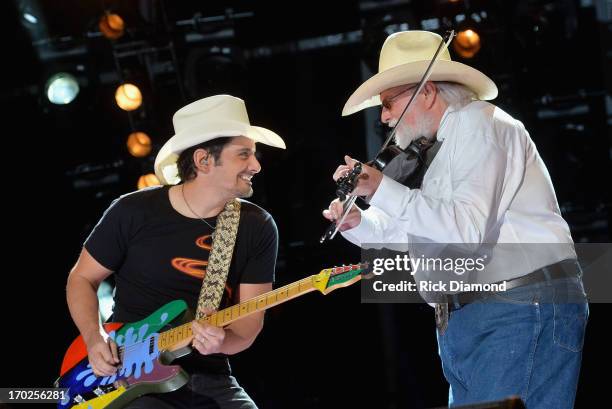Brad Paisley and Charlie Daniels perform during the 2013 CMA Music Festival on June 9, 2013 in Nashville, Tennessee.