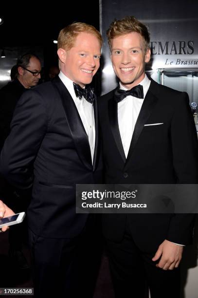 Jesse Tyler Ferguson and Barrett Foa attend The 67th Annual Tony Awards green room at Radio City Music Hall on June 9, 2013 in New York City.
