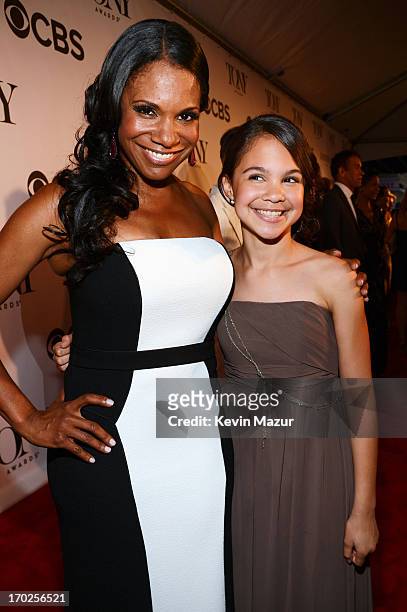 Actress Audra McDonald and Zoe Madeline Donovan attend The 67th Annual Tony Awards at Radio City Music Hall on June 9, 2013 in New York City.