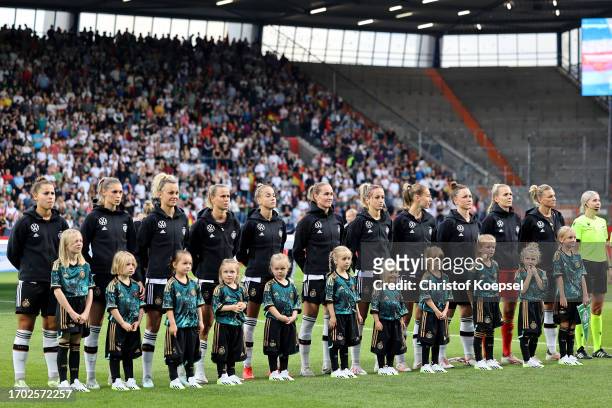The team of Germany stands for the national anthem during the UEFA Women's Nations League match between Germany and Iceland at Vonovia Ruhrstadion on...