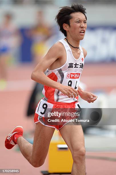 Sota Hoshi competes in the Men's 5,000m during day three of the 97th Japan Track and Field Championships at Ajinomoto Stadium on June 9, 2013 in...