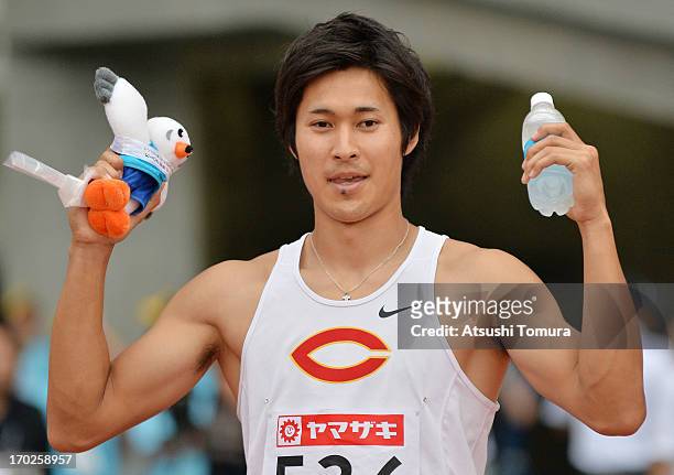 Shota Iizuka celebrates winning in the Men's 200m during day three of the 97th Japan Track and Field Championships at Ajinomoto Stadium on June 9,...