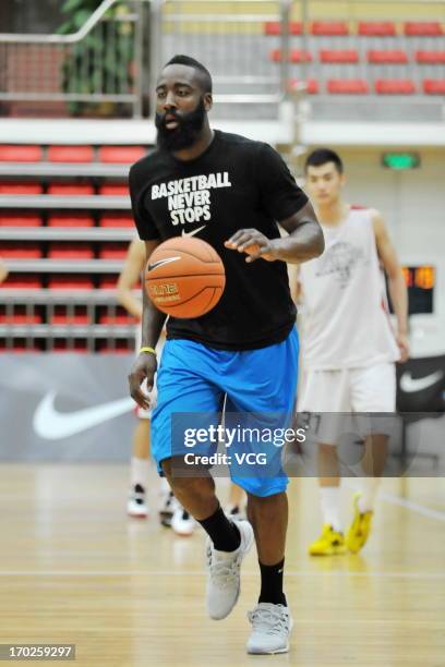 American professional basketball player James Harden of Houston Rockets in action during a meeting with fans on June 9, 2013 in Guangzhou, Guangdong...