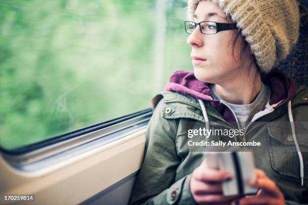 teenage girl on a train - train ticket stock pictures, royalty-free photos & images