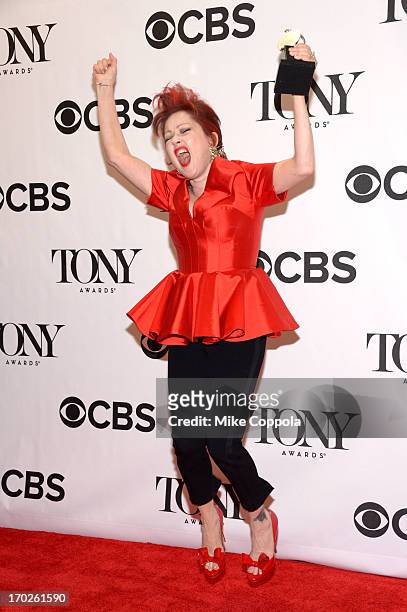 Musician Cyndi Lauper, winner of the Tony Award for Best Original Score for 'Kinky Boots,' poses in the press room at The 67th Annual Tony Awards at...