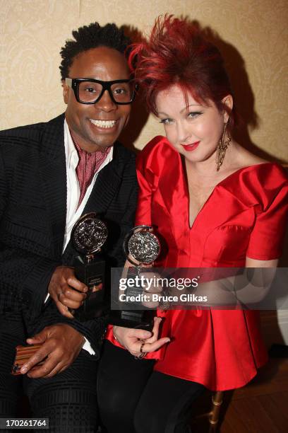Actor Billy Porter, winner of the award for Best Performance by a Leading Actor in a Musical for 'Kinky Boots' pose and composer Cyndi Lauper, winner...