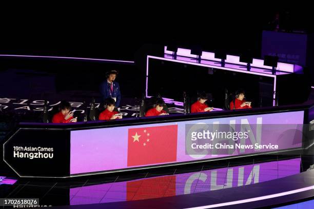 Players of Team China compete against Team Malaysia in the Esports - Arena of Valor Asian Games Version Final on day three of the 19th Asian Games at...