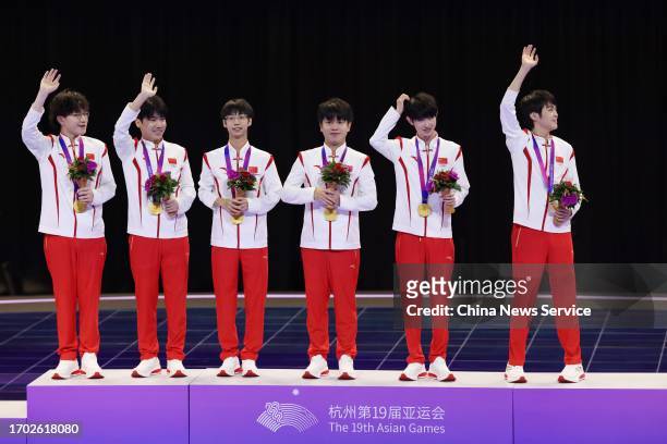 Gold medalists Team China pose during the medal ceremony for the Esports - Arena of Valor Asian Games Version Final on day three of the 19th Asian...