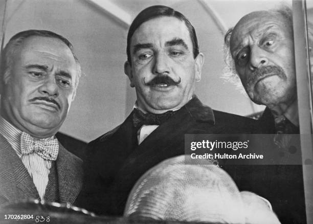 Actors Martin Balsam , Albert Finney , and George Coulouris in a scene from Agatha Christie's 'Murder On The Orient Express', 1974.