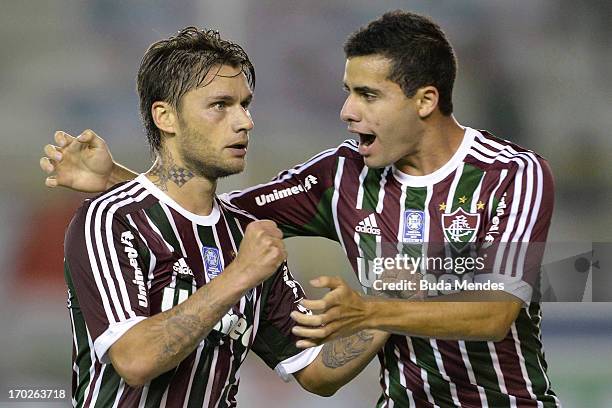 Rafael Sobis and Eduardo of Fluminense celebrates a scored goal during the match between Fluminense and Goias a as part of Brazilian Championship...