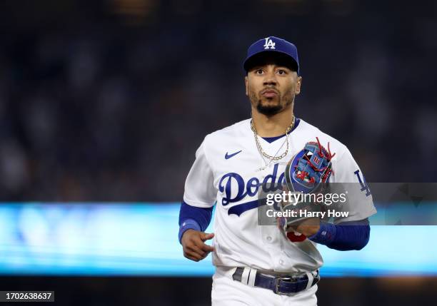 Mookie Betts of the Los Angeles Dodgers leaves the field during a 3-2 win over the San Francisco Giants at Dodger Stadium on September 24, 2023 in...