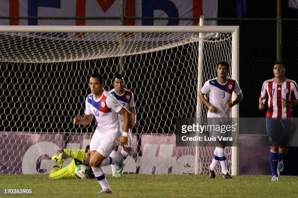 Alexis Sanchez of Chile in action during the match between Paraguay and Chile as part of the South American Qualifiers for FIFA World Cup Brazil...