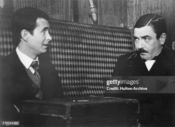 Actors Anthony Perkins , and Albert Finney in a scene from Agatha Christie's 'Murder On The Orient Express', 1974.