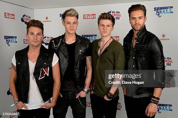 Adam Pitts, Ryan Fletcher, Joel Peat and Andy Brown of Lawson pose in a backstage studio during the Capital Summertime Ball at Wembley Stadium on...