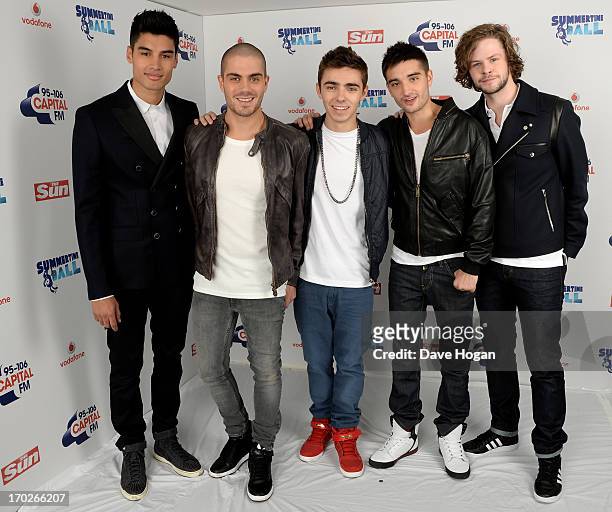 Siva Kaneswaran, Max George, Nathan Sykes, Tom Parker and Jay McGuiness of The Wanted pose in a backstage studio during the Capital Summertime Ball...