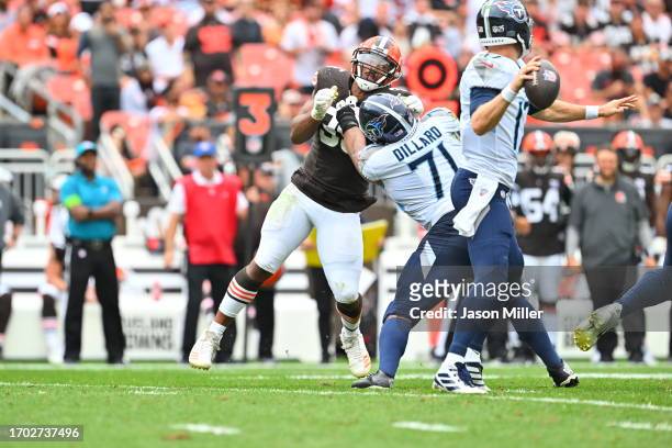 Defensive end Myles Garrett of the Cleveland Browns is blocked by offensive tackle Andre Dillard of the Tennessee Titans during the third quarter at...
