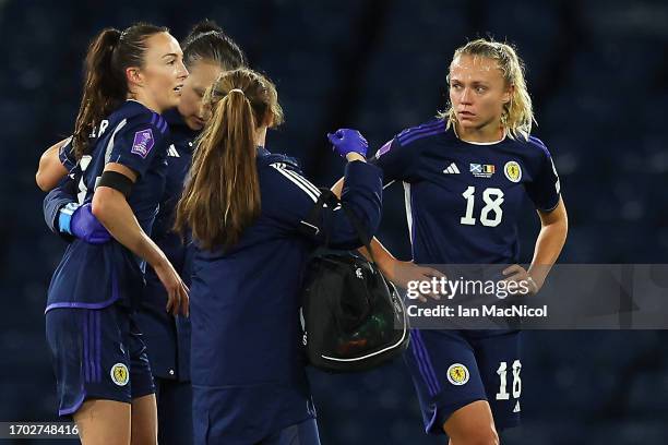 Caroline Weir of Scotland is helped to her feet having suffered an injury during the UEFA Women's Nations League Group A match between Scotland and...