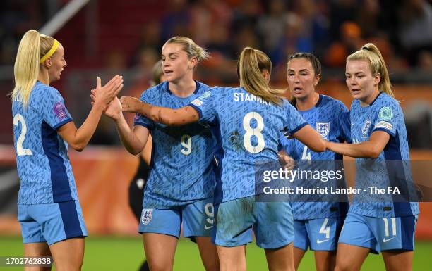 Alessia Russo of England celebrates with teammates after scoring the team's first goal during the UEFA Women's Nations League Group A match between...